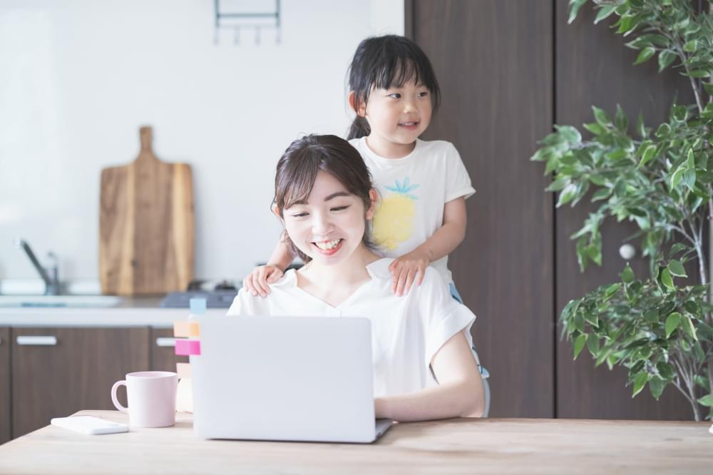 Asian-woman-doing-telework-with-her-daughter-scaled-1.jpg