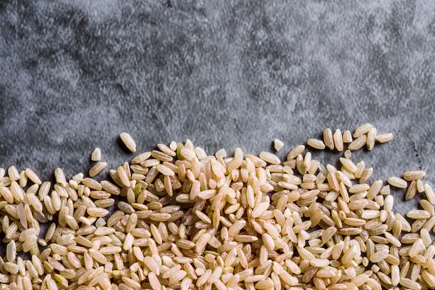 Scattered-brown-rice-on-table-1.jpg