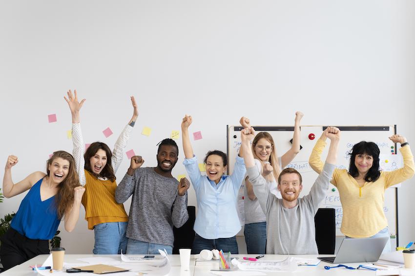 Medium-shot-colleagues-celebrating-1.jpg