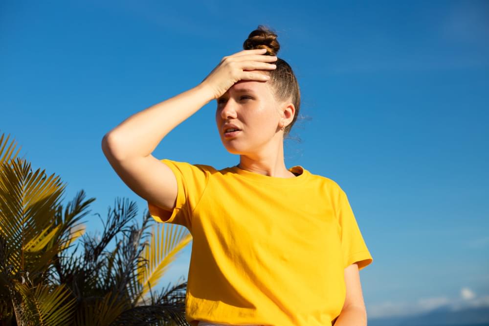 Girl-is-suffering-from-heat-woman-with-heatstroke-having-sunstroke-summer-hot-weather-dangerous-scaled-1.jpg
